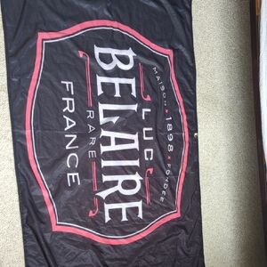 Luc Belaire Black and Red Banner